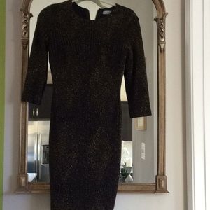 Abbeline cocktail dress black with gold lines.